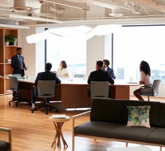 Clean office conference room with tables and chairs